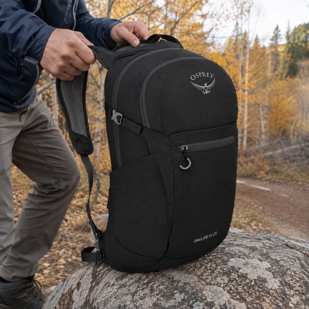 Osprey Daylite Plus daypack lifted off a boulder at an autumn trailhead